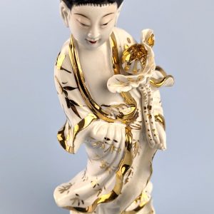 Vintage porcelain figurine of Kuan Yin